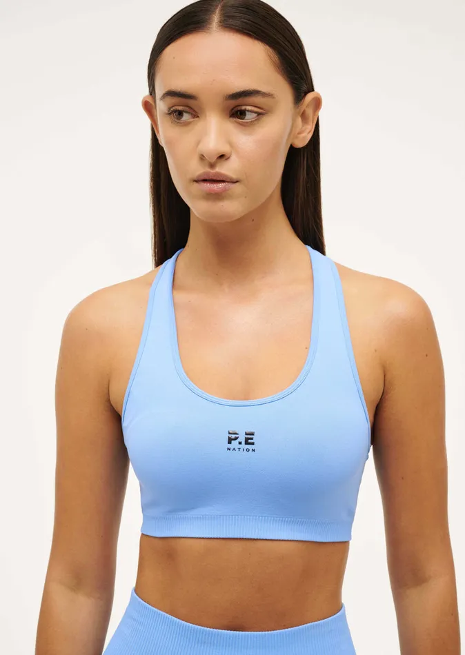 SportsBras PE Nation Women RESTORE SEAMLESS SPORTS BRA IN CORNFLOWER BLUE