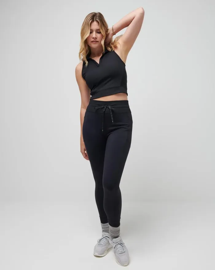 TravisMathew MOVEKNIT SLEEVELESS VNECK POLO Black Women Polos TravisMathew MOVEKNIT SLEEVELESS VNECK POLO Black Women Polos