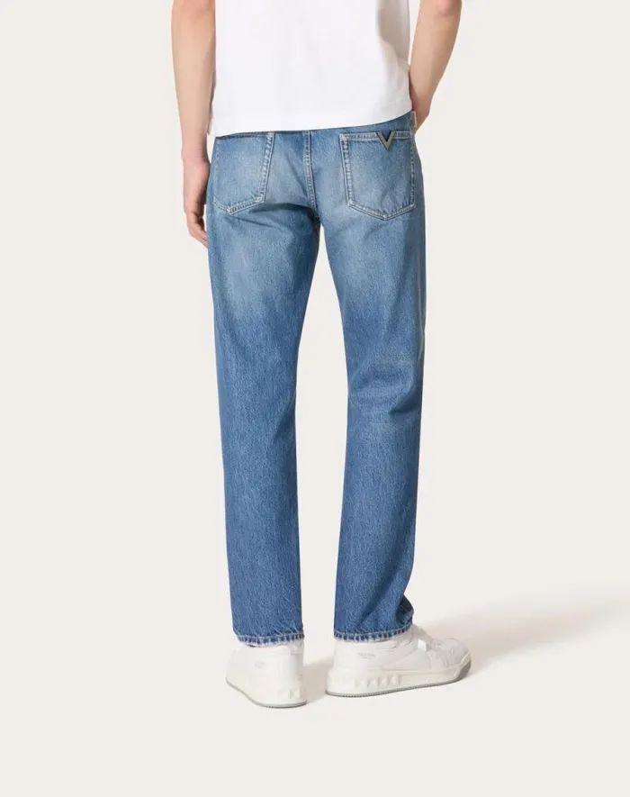 Valentino Denim Man Denim Pants With Metallic V Detail For Man In Denim Denim Valentino Denim Man Denim Pants With Metallic V Detail For Man In Denim Denim