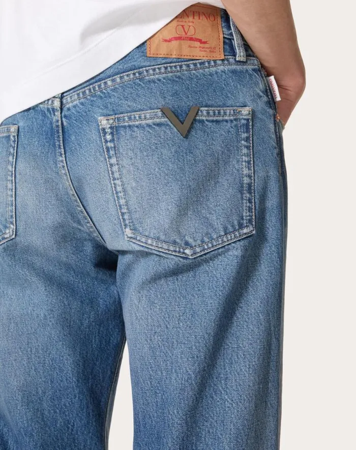 Valentino Denim Man Denim Pants With Metallic V Detail For Man In Denim Denim Valentino Denim Man Denim Pants With Metallic V Detail For Man In Denim Denim
