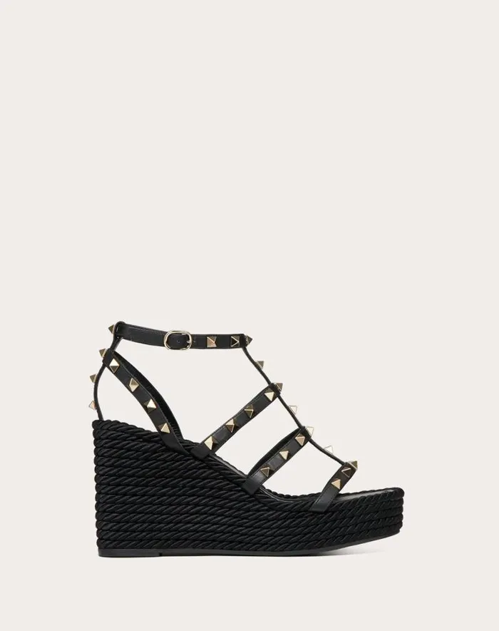 Valentino Espadrilles And Wedges Woman Rockstud Ankle Strap Wedge Sandal In Calfskin Leather 95 Mm For Woman In Black Black