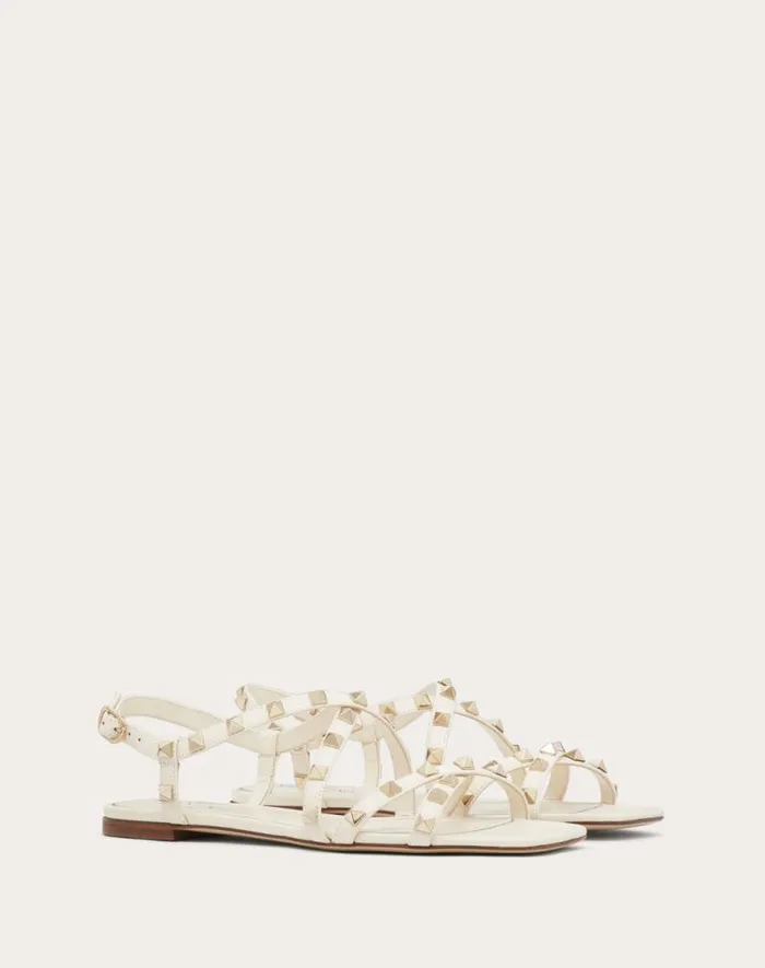 Valentino Sandals Woman Calfskin Rockstud Sandal With Straps For Woman In Light Ivory Light Ivory Valentino Sandals Woman Calfskin Rockstud Sandal With Straps For Woman In Light Ivory Light Ivory