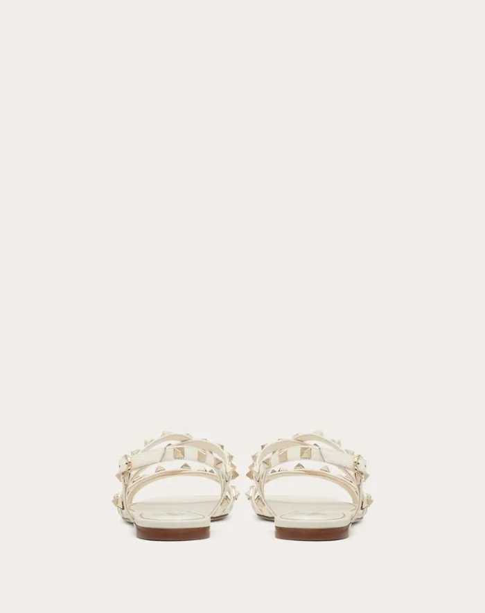Valentino Sandals Woman Calfskin Rockstud Sandal With Straps For Woman In Light Ivory Light Ivory Valentino Sandals Woman Calfskin Rockstud Sandal With Straps For Woman In Light Ivory Light Ivory