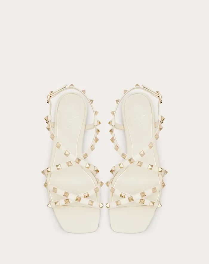 Valentino Sandals Woman Calfskin Rockstud Sandal With Straps For Woman In Light Ivory Light Ivory Valentino Sandals Woman Calfskin Rockstud Sandal With Straps For Woman In Light Ivory Light Ivory