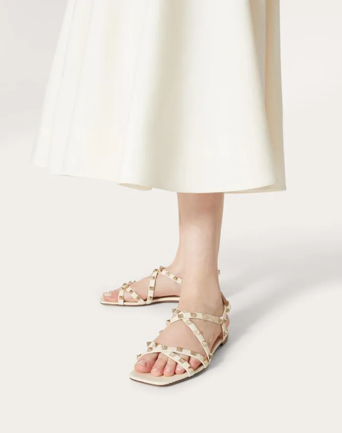 Valentino Sandals Woman Calfskin Rockstud Sandal With Straps For Woman In Light Ivory Light Ivory Valentino Sandals Woman Calfskin Rockstud Sandal With Straps For Woman In Light Ivory Light Ivory