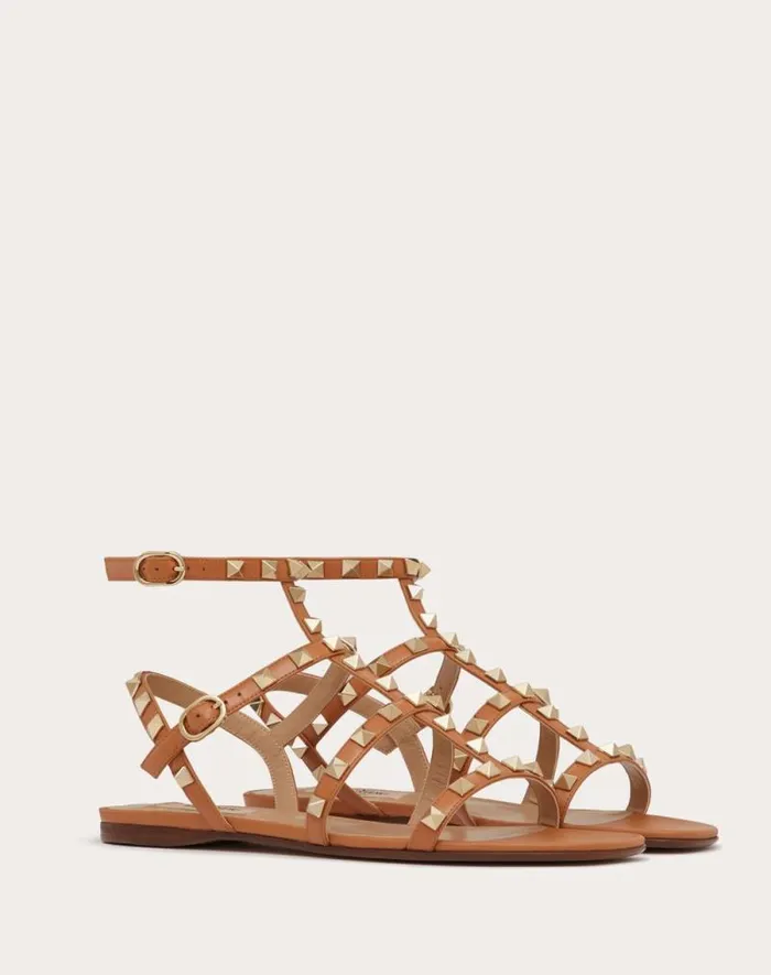 Valentino Sandals Woman Rockstud Flat Calfskin Sandal With Straps For Woman In Black Black Valentino Sandals Woman Rockstud Flat Calfskin Sandal With Straps For Woman In Black Black