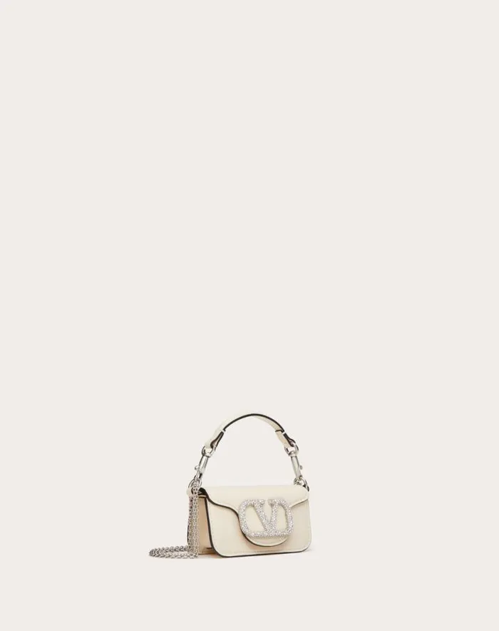 Valentino Shoulder Bags Woman Valentino Garavani Loc Micro Bag With Chain And Jewel Logo For Woman In Light Ivory Light Ivory Valentino Shoulder Bags Woman Valentino Garavani Loc Micro Bag With Chain And Jewel Logo For Woman In Light Ivory Light Ivory