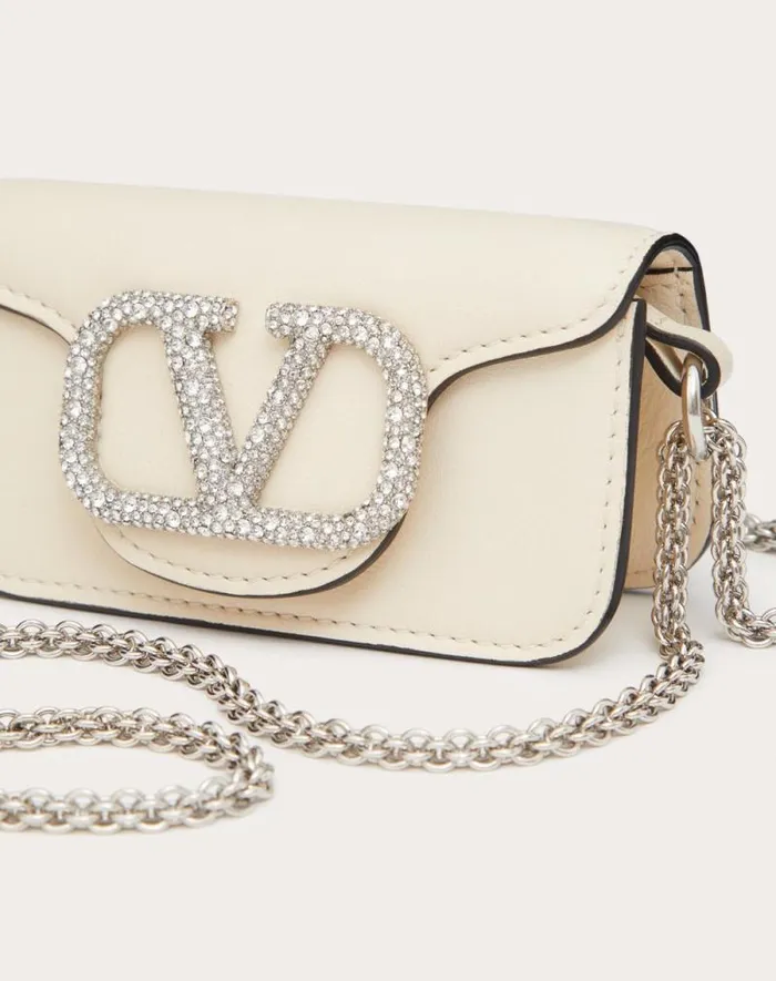 Valentino Shoulder Bags Woman Valentino Garavani Loc Micro Bag With Chain And Jewel Logo For Woman In Light Ivory Light Ivory Valentino Shoulder Bags Woman Valentino Garavani Loc Micro Bag With Chain And Jewel Logo For Woman In Light Ivory Light Ivory