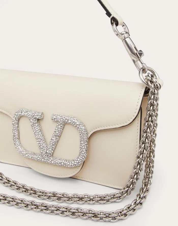 Valentino Shoulder Bags Woman Valentino Garavani Loc Small Shoulder Bag With Jewel Logo For Woman In Rose Cannelle Rose Cannelle Valentino Shoulder Bags Woman Valentino Garavani Loc Small Shoulder Bag With Jewel Logo For Woman In Rose Cannelle Rose Cannelle