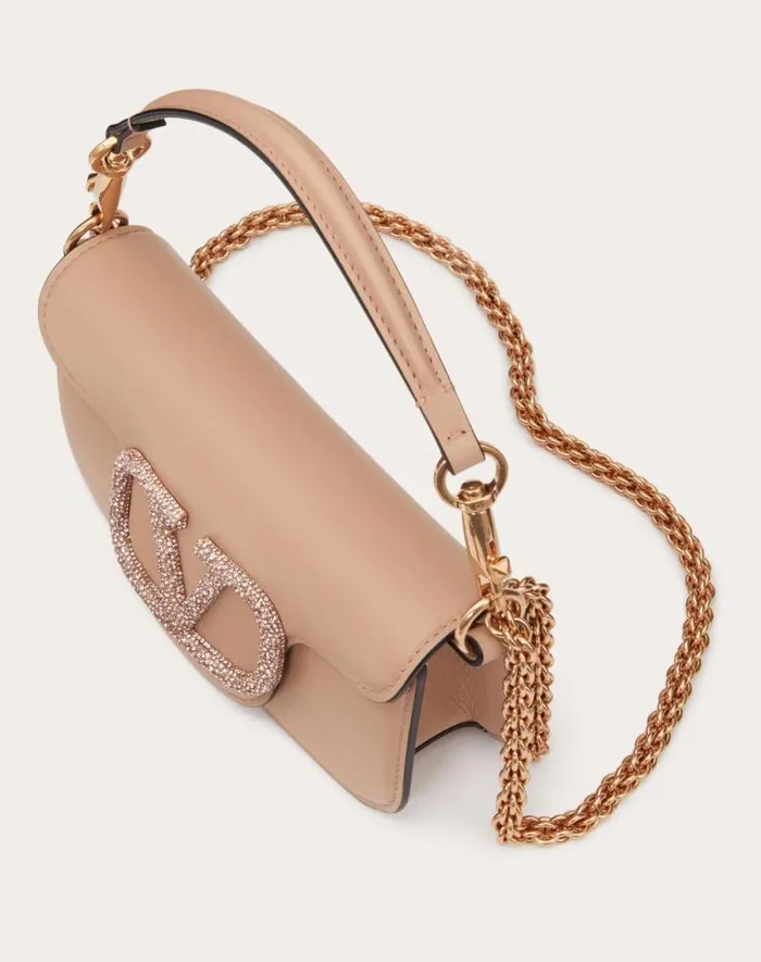 Valentino Shoulder Bags Woman Valentino Garavani Loc Small Shoulder Bag With Jewel Logo For Woman In Rose Cannelle Rose Cannelle Valentino Shoulder Bags Woman Valentino Garavani Loc Small Shoulder Bag With Jewel Logo For Woman In Rose Cannelle Rose Cannelle