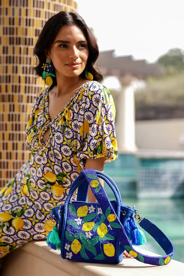 Women Totes America and Beyond Positano Handheld Bag